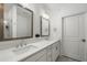 Bathroom with double sink, vanity, tile floors, and a shower and toilet at 383 Grant Se Cir # 1634, Atlanta, GA 30315