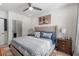 Well lit bedroom featuring a comfortable queen-sized bed and modern decor and carpet at 383 Grant Se Cir # 1634, Atlanta, GA 30315