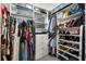 Walk-in closet with organized shelving for clothing, shoes, and accessories at 383 Grant Se Cir # 1634, Atlanta, GA 30315