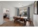 Dining room with an open view into the Primary bedroom and outdoor balcony at 383 Grant Se Cir # 1634, Atlanta, GA 30315