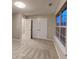 Cozy carpeted bedroom featuring natural light and a double door closet at 640 City Park Dr, Mcdonough, GA 30252