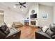Cozy living room with a stone fireplace and vaulted ceilings at 260 Harmony Woods Dr, Dallas, GA 30157