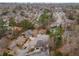 This aerial view shows a residential area and lush trees at 2861 Dorby Close Ne, Brookhaven, GA 30319
