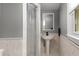 Cozy bathroom with stylish fixtures, a pedestal sink, and a shower at 2861 Dorby Close Ne, Brookhaven, GA 30319