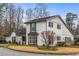 Charming two-story white brick home with black shutters and a well-manicured lawn at 2861 Dorby Close Ne, Brookhaven, GA 30319