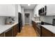 Modern kitchen featuring stainless steel appliances, white countertops, and wood cabinetry at 2861 Dorby Close Ne, Brookhaven, GA 30319