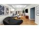 Bright living room featuring hardwood floors, modern lighting, and contemporary decor at 2861 Dorby Close Ne, Brookhaven, GA 30319