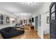 Bright living room featuring hardwood floors, modern lighting, and contemporary decor at 2861 Dorby Close Ne, Brookhaven, GA 30319