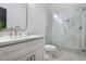 Modern bathroom with glass enclosed shower, tile flooring, and vanity with ample storage at 190 Adair Se Ave, Atlanta, GA 30315