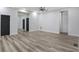 Generous living area offering versatile space, wood-look flooring, and neutral decor at 190 Adair Se Ave, Atlanta, GA 30315