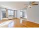 Light-filled bedroom with a ceiling fan and mirrored closet doors at 215 Piedmont Ne Ave # 204, Atlanta, GA 30308