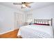 Bedroom featuring hardwood floors, ceiling fan, closet and natural light at 2798 Tralyn Ct, Decatur, GA 30034