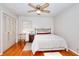 Bedroom featuring hardwood floors, ceiling fan, closet and windows at 2798 Tralyn Ct, Decatur, GA 30034