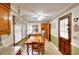 Bright dining room with a wooden table, natural light, and neutral paint scheme at 2798 Tralyn Ct, Decatur, GA 30034