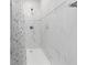 Walk-in shower with elegant white and gray tiling and modern fixtures at 2825 Middleburg Dr, Atlanta, GA 30349