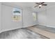 Cozy bedroom featuring new floors, fresh paint, and natural light from the windows at 2825 Middleburg Dr, Atlanta, GA 30349