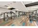 Spacious fitness center with modern exercise equipment and stylish flooring, catering to residents' health needs at 400 W Peachtree Nw St # 3216, Atlanta, GA 30308