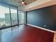 Living room with wood floors and sliding doors to balcony at 400 W Peachtree Nw St # 3216, Atlanta, GA 30308