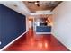 Spacious living room with wood floors and concrete ceiling at 400 W Peachtree Nw St # 3216, Atlanta, GA 30308