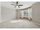 Bedroom with ceiling fan, neutral colors, wood-look floors and a bay window at 434 Mcgill Ne Pl, Atlanta, GA 30312