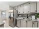 Well-equipped kitchen with stainless steel appliances, granite countertops, and ample cabinet space at 434 Mcgill Ne Pl, Atlanta, GA 30312