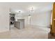 Bright and airy living room area with tiled floors offering a flexible design and easy transition to the kitchen at 434 Mcgill Ne Pl, Atlanta, GA 30312