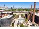 Aerial view of a building and rooftop pool with the city skyline in the distance at 170 Boulevard Se # 412E, Atlanta, GA 30312