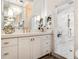 Bright bathroom featuring a white vanity, quartz countertop and gold hardware at 170 Boulevard Se # 412E, Atlanta, GA 30312
