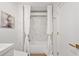 Bright bathroom featuring a tub with white tile surround and matching white shower curtain and stylish gold accents at 170 Boulevard Se # 412E, Atlanta, GA 30312