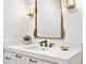 Elegant bathroom featuring quartz countertops, classic fixtures, custom vanity, and stylish gold accents at 170 Boulevard Se # 412E, Atlanta, GA 30312