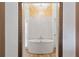Modern bathroom features a soaking tub, gold finishes, and modern lighting at 170 Boulevard Se # 412E, Atlanta, GA 30312
