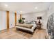 Comfortable bedroom features hardwood floors, neutral tones, and ample lighting at 170 Boulevard Se # 412E, Atlanta, GA 30312