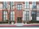Brick building entrance with large windows, and flower boxes adding a touch of charm at 170 Boulevard Se # 412E, Atlanta, GA 30312