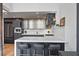 Modern kitchen features stainless steel appliances, a breakfast bar, and sleek cabinetry at 170 Boulevard Se # 412E, Atlanta, GA 30312