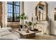 Cozy living room with fireplace, large windows, and a comfortable sofa, creating a relaxing atmosphere at 170 Boulevard Se # 412E, Atlanta, GA 30312