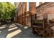 Walkway through the complex with original exposed brickwork, creating a blend of old and new at 170 Boulevard Se # 412E, Atlanta, GA 30312