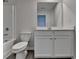 Neutral bathroom featuring vinyl flooring, a toilet, a tub, and a vanity at 1883 Frisco Way, Suwanee, GA 30024