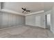 Spacious bedroom with neutral tones, a ceiling fan, and carpet floors at 1883 Frisco Way, Suwanee, GA 30024