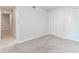 A carpeted bedroom shows an open doorway to another room and two closets at 20 Ivy Ne Rdg, Atlanta, GA 30342