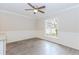 Bright dining area featuring a modern ceiling fan and a large window at 20 Ivy Ne Rdg, Atlanta, GA 30342