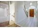 Welcoming foyer features tile flooring, staircase, and a decorative entry door at 205 Pine Knott Rd, Fayetteville, GA 30214