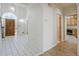 Inviting foyer with tile flooring and a view into the adjacent kitchen at 205 Pine Knott Rd, Fayetteville, GA 30214