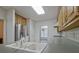 Kitchen with a double sink and stainless steel appliances at 205 Pine Knott Rd, Fayetteville, GA 30214