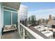 Modern balcony with seating and expansive city views at 3325 Piedmont Ne Rd # 1907, Atlanta, GA 30305