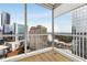 Glass enclosed balcony with scenic city view, hardwood floors and glass windows at 3325 Piedmont Ne Rd # 1907, Atlanta, GA 30305