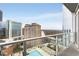Balcony view of a community pool and the city skyline at 3325 Piedmont Ne Rd # 1907, Atlanta, GA 30305