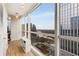 Spacious balcony with city views and floor to ceiling glass windows at 3325 Piedmont Ne Rd # 1907, Atlanta, GA 30305