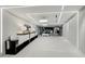Bright hallway with contemporary lighting and stylish built-in shelving offers a clean and inviting atmosphere at 3325 Piedmont Ne Rd # 1907, Atlanta, GA 30305