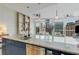 Open kitchen with a large island, stainless steel appliances, and city views at 3325 Piedmont Ne Rd # 1907, Atlanta, GA 30305