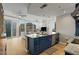 Open concept kitchen with a large island, granite countertops, and modern appliances at 3325 Piedmont Ne Rd # 1907, Atlanta, GA 30305